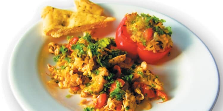 Ovnbagte peberfrugter med fyld af kalkun og ris